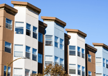 Modern residential condominium complex with multiple buildings